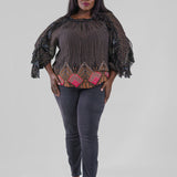 Plus size, gathered neck, long sleeves with a ruffle detail throughout the length