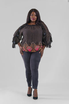 Plus size, gathered neck, long sleeves with a ruffle detail throughout the length