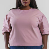 Plus size, pearl top is elevated take on an everyday cotton top