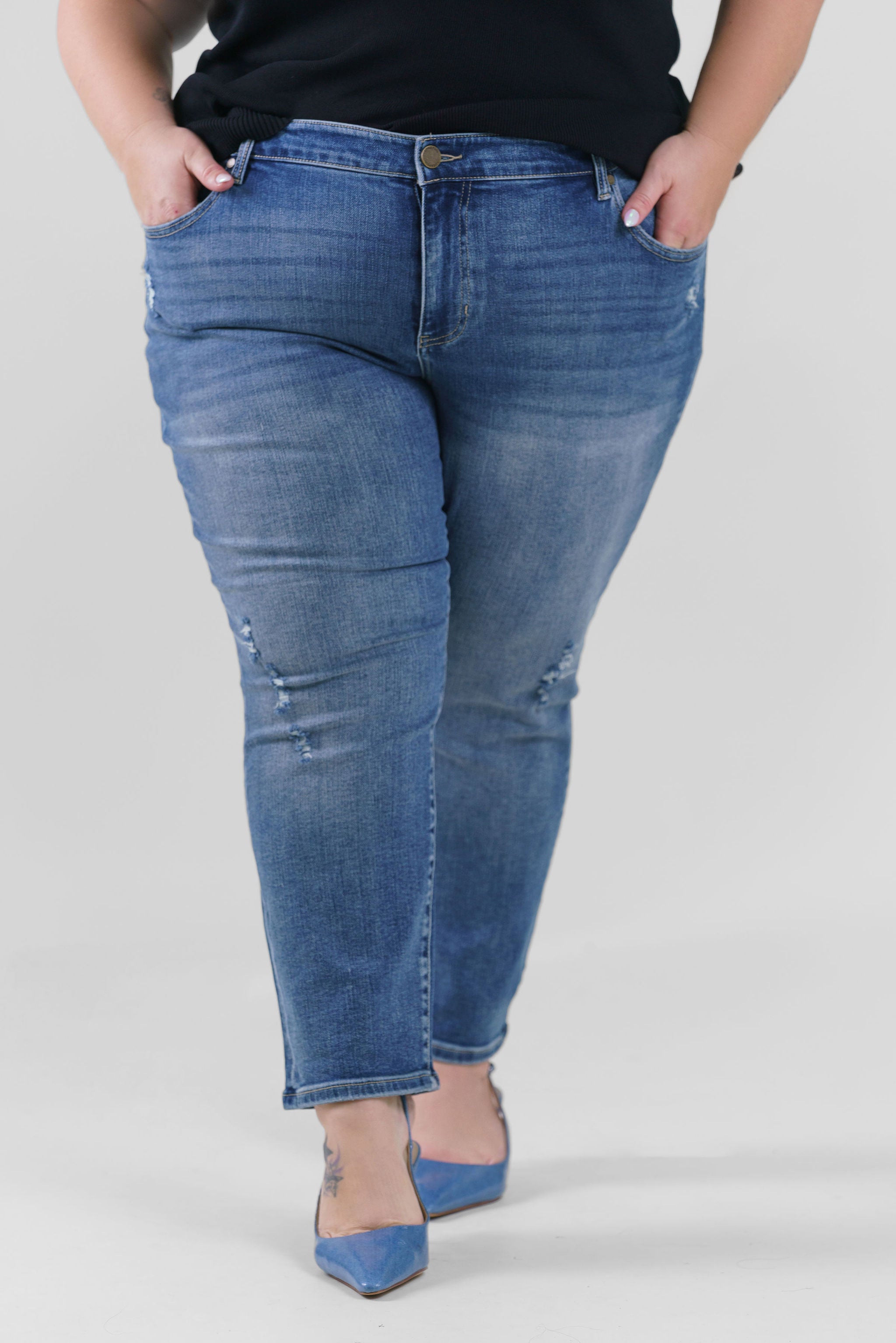 Plus size denim, destruction finish at the back hem