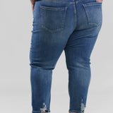 Plus size denim, destruction finish at the back hem