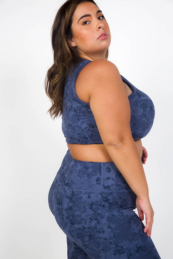woman in plus size activewear 