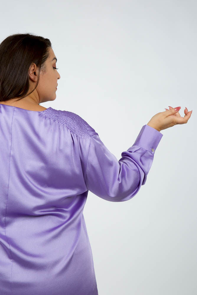 Smocked long sleeve blouse designed by Vince